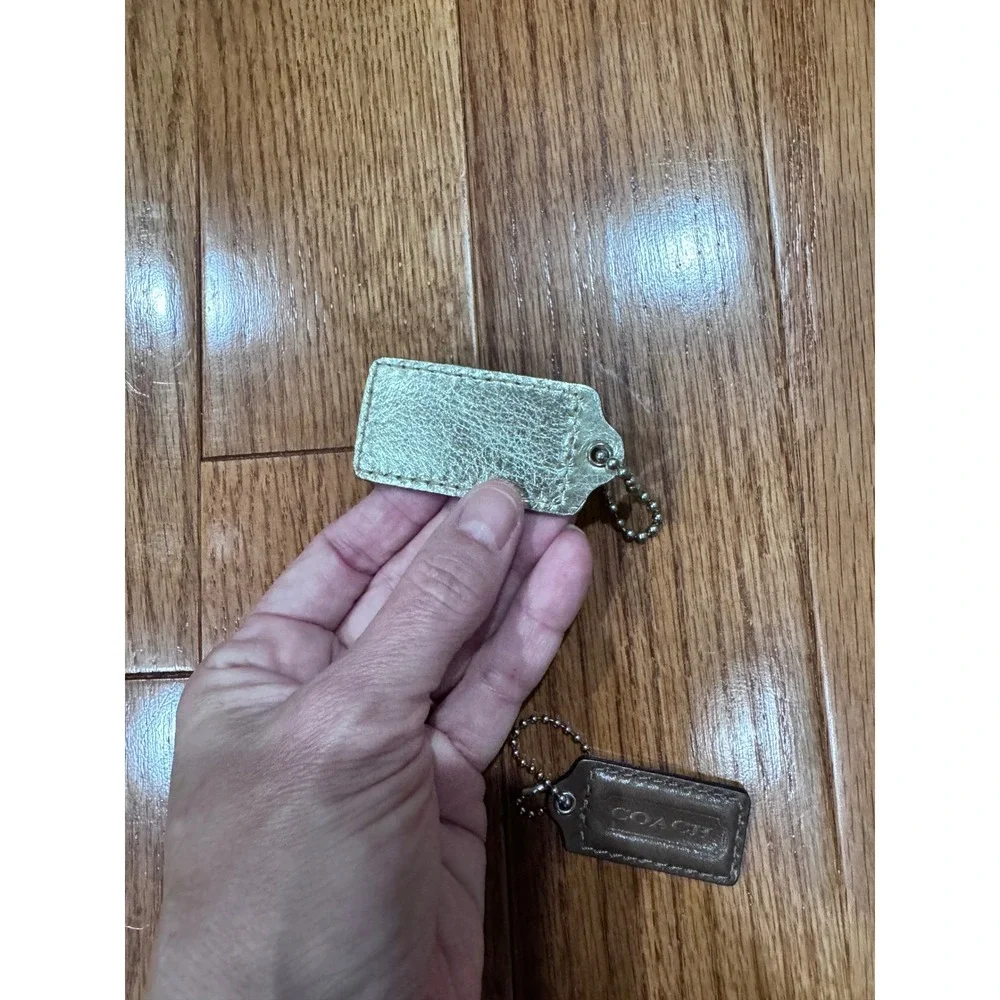 Lot of 2 Coach Leather Bag Charms Keychains Set Gold Brown Authentic‎